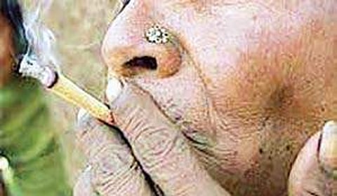 Representational picture of a woman smoking