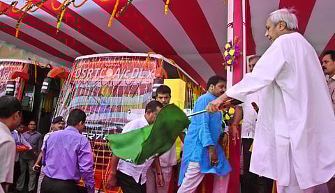 Chief Minister Naveen Patnaik flagging off AC buses at Paribahan Bhawan in Bhubaneswar on Saturday | Express