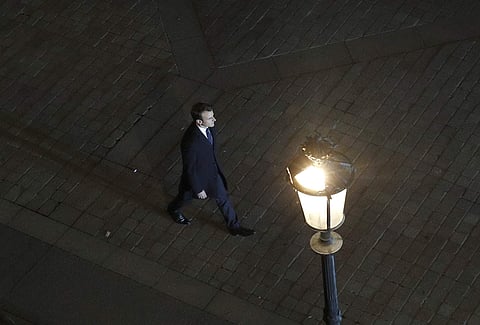 Incoming French President Emmanuel Macron walks towards the stage to address his supporters at the Louvre Palace in Paris, Sunday May 7, 2017. (Photo|AP)