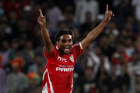 Kings XI Punjab player Sandeep Sharma celebrates the wicket of Kolkata Knight Riders captain Gautam Gambhir during an IPL match between KKR and KXI Punjab. | PTI