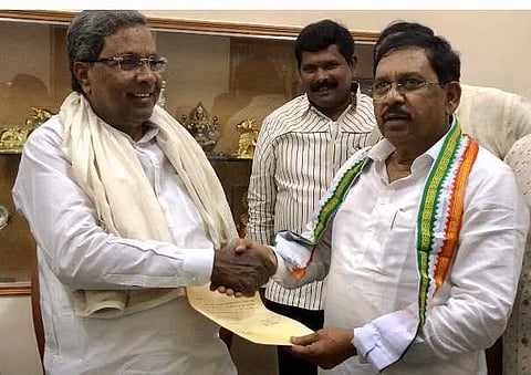 Chief Minister Siddaramaiah with KPCC president G Parameshwara, after the latter submitted his resignation. (EPS)