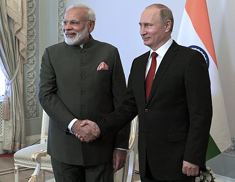 Russian President Vladimir Putin, right, shakes hands with India's Prime Minister Narendra Modi prior their talks at the St. Petersburg International Economic Forum in St. Petersburg, Russia, Thursday, June 1, 2017. (Photo|AP)