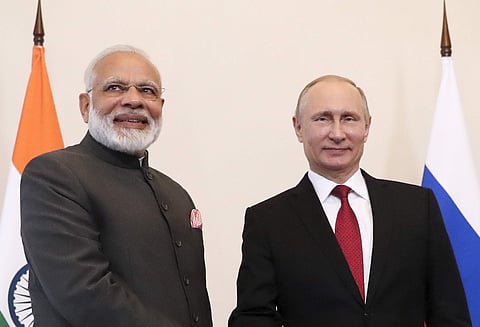 Russian President Vladimir Putin, right, and India's Prime Minister Narendra Modi pose for a photo prior their talks at the St. Petersburg International Economic Forum in St. Petersburg, Russia, Thursday, June 1, 2017. (AP)