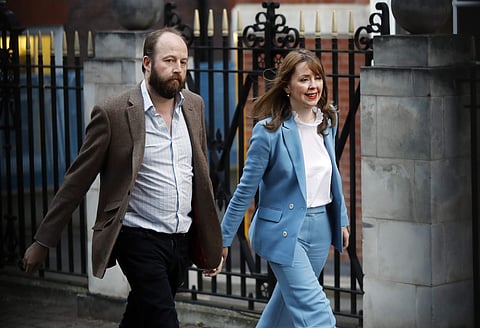 In this Friday, June 9, 2017 file photo, Prime Minister Theresa May's chief of staff Nick Timothy, left, and Joint-chief of staff Fiona Hill leave Conservative Party headquarters in London. (AP)