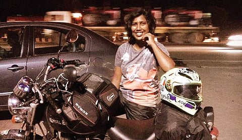 Alisha Jebin (24) with her Royal Enfield Thunderbird 350. On Sunday, she broke the previous record set by Chennai girl Chithra Priya in December 2011 | Express