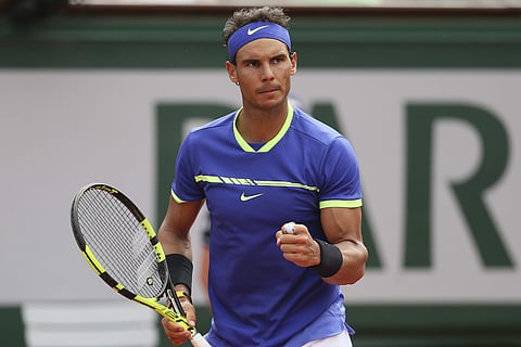 French Open champ Rafael Nadal braced for bittersweet symphony at Wimbledon