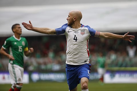 United States' Michael Bradley celebrates after scoring against Mexico during a World Cup soccer qualifying match at the Azteca Stadium in Mexico City on Sunday. (Photo | AP)