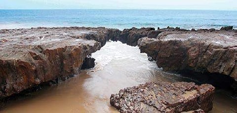 The natural rock arch at Mangamaripeta beach between Visakhapatnam and Bheemunipatnam remains a major tourist attractions in the city | Express
