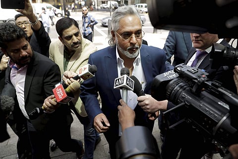 Former Indian politician and billionaire businessman Vijay Mallya centre arrives for his extradition hearing at Westminster Magistrates Court in London Tuesday June 13 2017.(PTI)