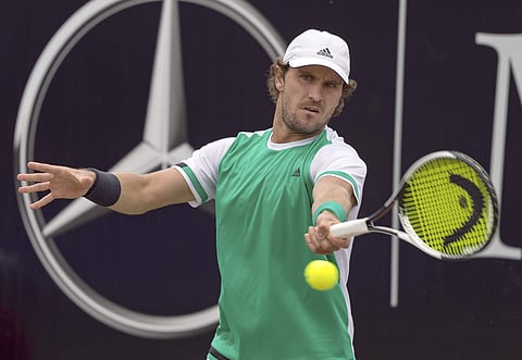 Germany's Mischa Zverev returns the ball to Germany's Tommy Haas during their quarterfinal match at the Mercedes Cup tennis tournament in Stuttgart. | AP