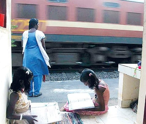 Anjana and Archana are immersed in studies while their mother Rahna is on duty at Aroor level crossing | melton antony