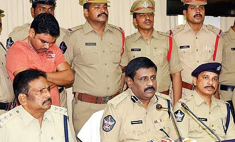 DCP (Crimes) T Ravi Kumar Muthy produces the accused in murder case before the media in Vizag on Monday | Express