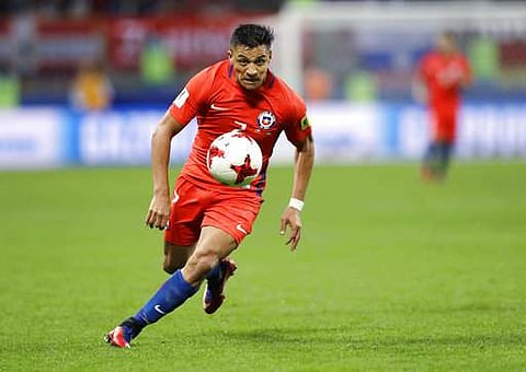 Chile's Alexis Sanchez goes with the ball during the Confederations Cup, Group B soccer match between Germany and Chile, at the Kazan Arena, Russia. | AP