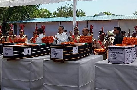Home Minister Rajnath Singh and Chhattisgarh CM Raman Singh paying tribute to CRPF troopers killed in Sukma attack. (Photo | EPS)