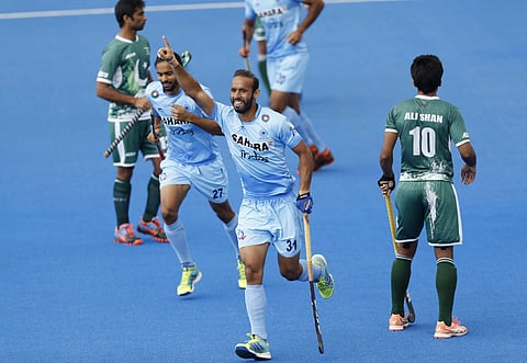 India's Ramandeep Singh celebrates scoring against Pakistan during the Men's World Hockey League match at Lee Valley Hockey Centre, London. | AP