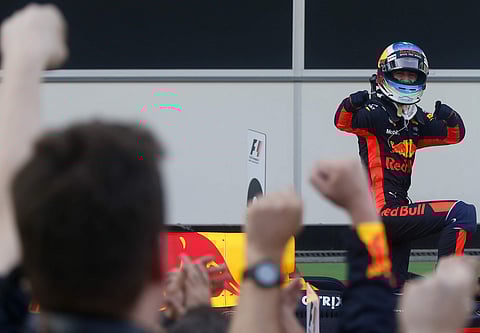 Red Bull driver Daniel Ricciardo of Australia celebrates after winning the Formula One Azerbaijan Grand Prix in Baku, Azerbaijan, Sunday. (Photo | AP)