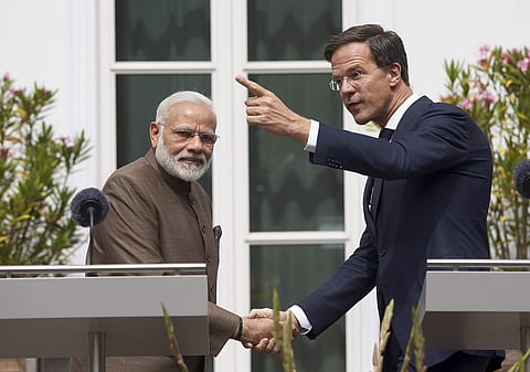 Indian Prime Minister Narendra Modi, left, and Dutch Prime Minister Mark Rutte shake hands upon their arrival at the Catshuis residence in The Hague, Netherlands. (AP)