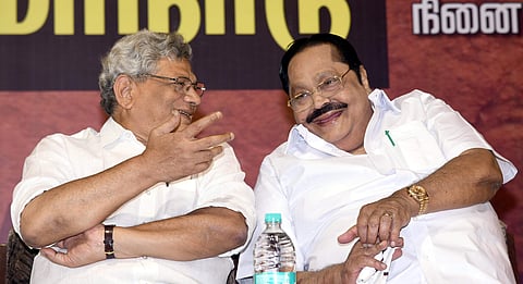 CPI-M general secretary Sitaram Yechury sharing a lighter moment with DMK leader Durai Murugan during a Tamil rights conference held to oppose the imposition of Hindi in Chennai on Monday | MARTIN LOUIS