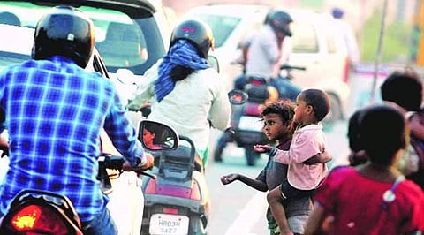 Child Beggars throng roads.