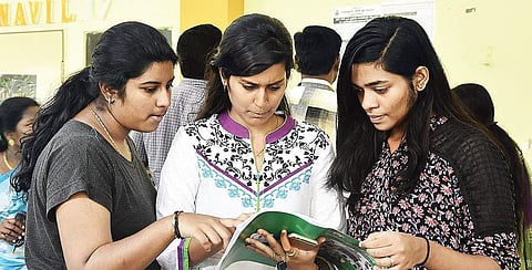 Student check application forms at the KMC on Tuesday | Sunish P Surendran