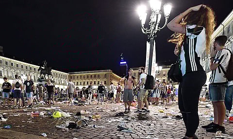 uventus fans leave San Carlo's square at the end of the Champions League final soccer match between Juventus and Real Madrid, in Turin, Italy,. (AP)