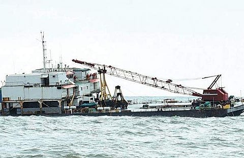 A barge with 27 workers on board seen sinking off Ullal on Saturday