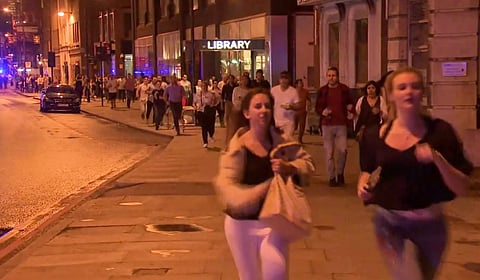 In this Saturday, June 3, 2017, image made from a video, people run from the scene an attack in London. | AP