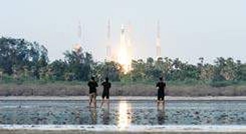 People looking on as GSLV MkIII is launched from the Satish Dhawan Space Research Centreat Sriharikotta on Monday.
