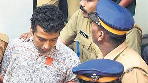 Main accused Pulsar Suni being taken away by the police.