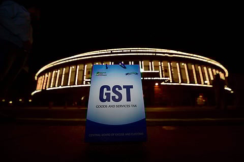 An illuminated Parliament at midinight launch of 'Goods and Services Tax GST ' in New Delhi. (Photo | PTI)