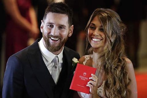 Newlyweds Lionel Messi and Antonella Roccuzzo pose for photographers after tying the knot in Rosario, Argentina. (File | AP)
