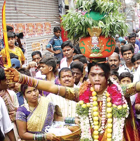 People participate to celebrate Bonalu at Mahankali Temple in Secunderabad on Sunday | Sathya Keerthi