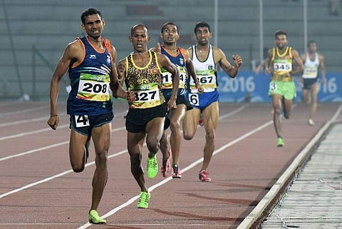 Sprinter Ajay Kumar Saroj (front) picked up surprise gold medals in men's 1500m race. (File | AFP)