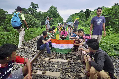 Agartala Indigenous People Front of Tripura IPFT and other tribal wings go on a road and rail blockade movement to demand a separate state- Tipraland in the outskirts of Agartala on Monday. (PTI)