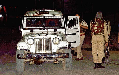 Security personnel stand guard after militants opened fire on the Amarnath yatris, killing seven pilgrims and injuring dozens of others in Anantnag, Jammu and Kashmir, late on Monday | PTI