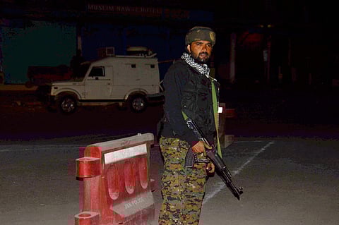 Security person stand guard after militants opened fire on the Amarnath Yatra. | PTI