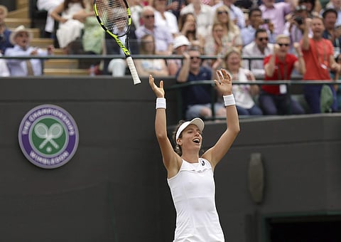 Britain's Johanna Konta celebrates after beating Caroline Garcia of France in their Women's Singles Match. | AP