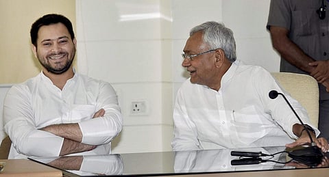 Bihar CM Nitish Kumar (R) with deputy chief minister Tejashwi Yadav. | File photo by PTI