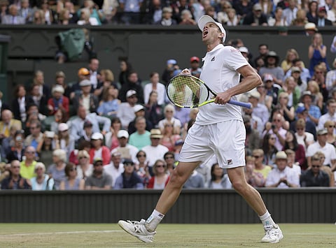 Sam Querrey of the United States celebrates after beating Britain's Andy Murray at the end of their Men's Singles Quarterfinal Match. | AP