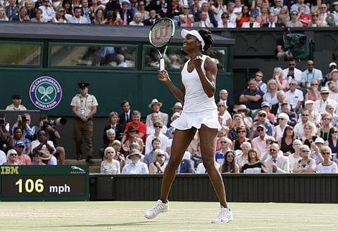 Venus Williams of the United States celebrates after beating Britain's Johanna Konta in the Women's Singles semifinal match. | AP