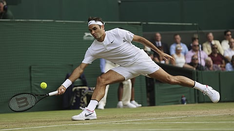 Roger Federer in action against Milos Raonic during their Men's Singles Quarterfinal Match ( FILE | AP)