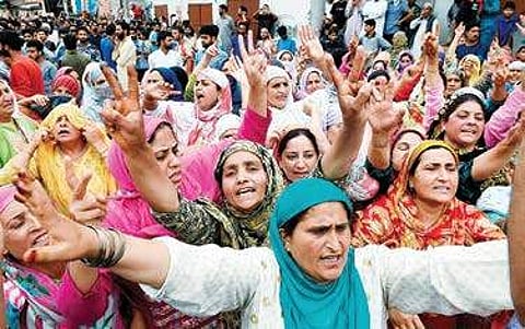Women shouting slogans during funeral prayers for one of the three militants killed in the overnight encounter with security forces in Budgam district, at Hyderpora in Srinagar on Wednesday| PTI