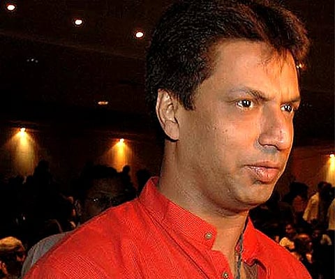 Director Madhur Bhandarkar cancelled the event after the Congress workers gathered at his proposed press meet venue to lodge their protest against the alleged defamatory content of the movie