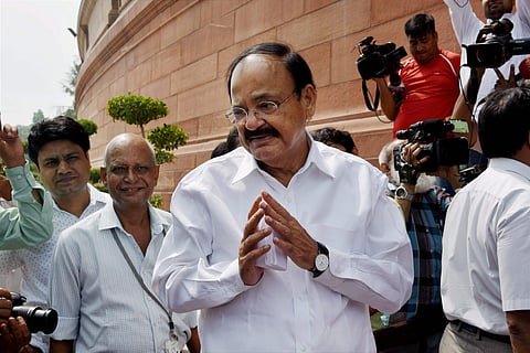 NDA's vice-presidential nominee Venkaiah Naidu on his way to attend nomination filing procession at Parliament in New Delhi on Tuesday. (PTI)