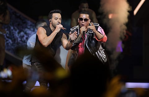 FILE - In this April 27, 2017 file photo, singers Luis Fonsi, left and Daddy Yankee perform during the Latin Billboard Awards in Coral Gables, Fla. Universal Music Latin Entertainment announced Wednesday, July 19, 2017. | AP
