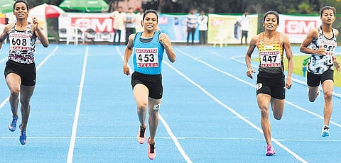 Kerala’s Anilda Thomas (centre) en route her victory in 400m on Tuesday