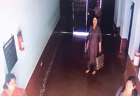 A video grab of AIADMK leader V K Sasikala(carrying a handbag) and her aide Ilavarasi (extreme left) inside the central prison