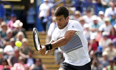 Serbia's Novak Djokovic in action against France's Gael Monfils in the Men's Singles Final, of the AEGON International tennis tournament at Devonshire Park, Eastbourne. | AP