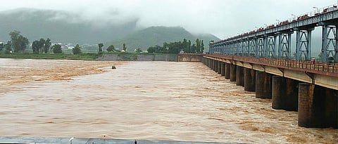 With increase in the inflows, officials lifted the crest gates of Gotta Barrage in Srikakulam on Wednesday | Express photo