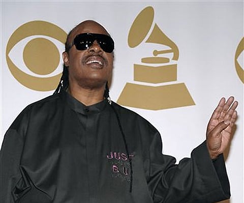 Musician Stevie Wonder poses backstage at the Grammy Nominations Concert in Los Angeles. AP